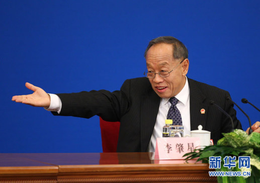 李肇星：中國各方面總體上已實(shí)現(xiàn)有法可依