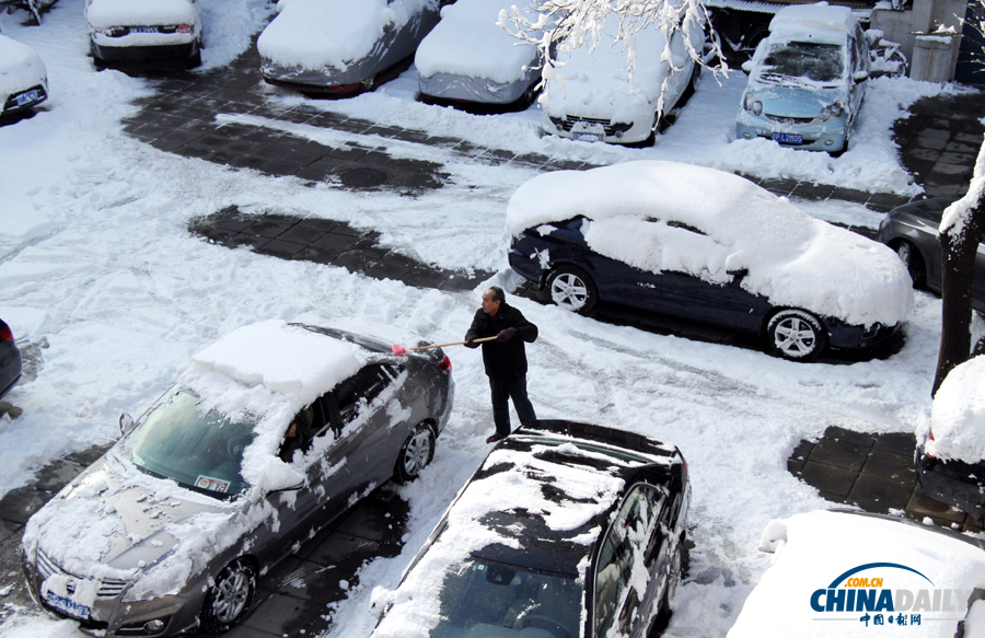 中國(guó)日?qǐng)?bào)直擊北京三月春雪