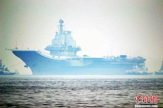 中國航母遼寧艦順利完成試驗試飛任務返回母港