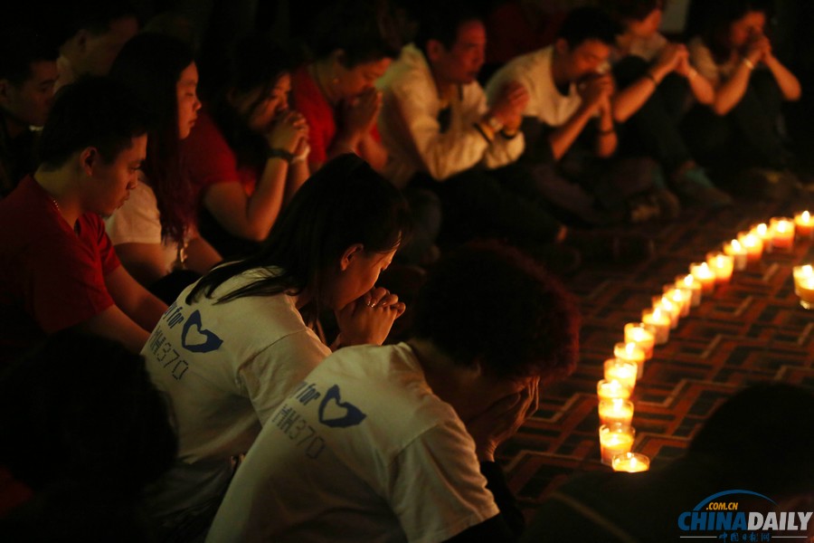 馬航MH370失聯客機整月 家屬為親人祈福守望