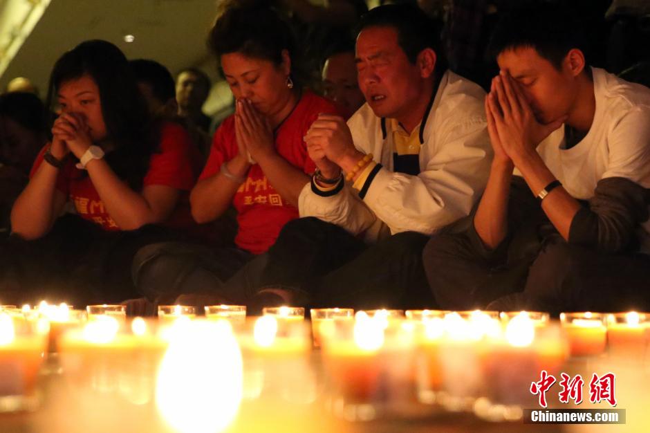 MH370航班失聯滿月 在京乘客家屬舉行祈福活動
