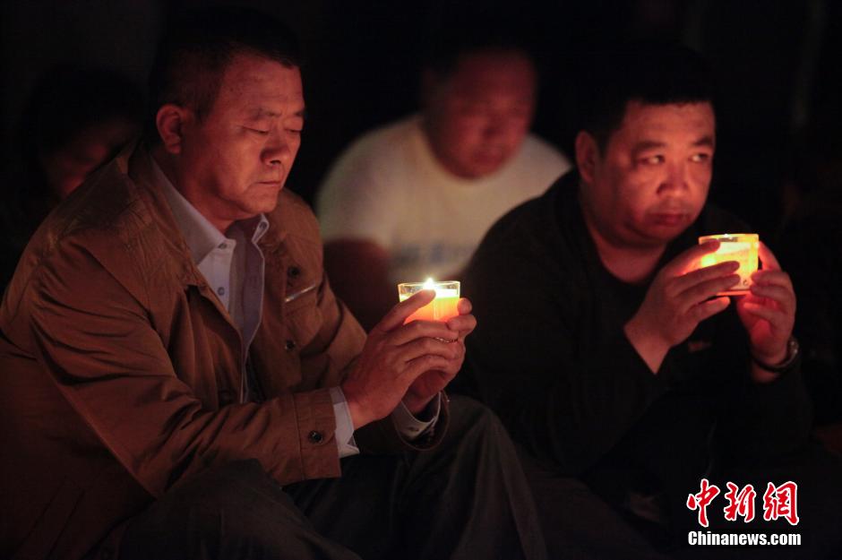 MH370航班失聯滿月 在京乘客家屬舉行祈福活動