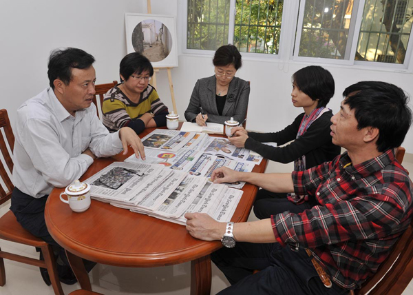 海口市委常委、宣傳部長吳川祝走訪中國日報海南記者站