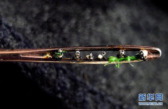在大米粒上創作 微縮藝術沒有最小只有更小