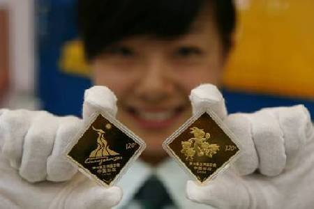 鑄就高端收藏經典 首款亞運郵票金磚全國首發(fā)