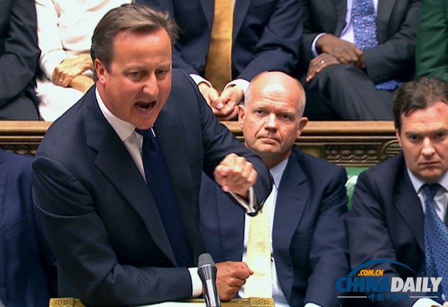 英國首相卡梅倫不敵議會反對 暫時擱置干預提議