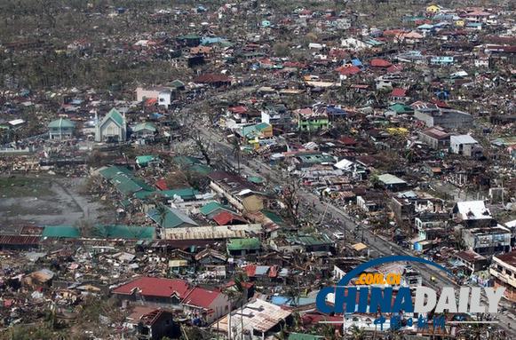 菲律賓災(zāi)民搶劫米倉(cāng) 墻體倒塌8人死亡
