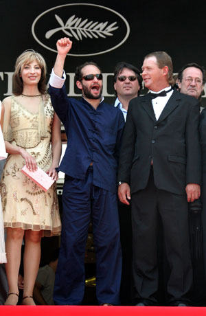 Mexican director Carlos Reygadas (C) arrives with cast members Maria Pankratz (L) and Cornelio Wall for a gala screening of the director's film