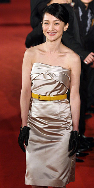 Chinese actress Zhou Xun walks on the red carpet in Shanghai Grand Theater on Saturday night, June 16, 2007, before the opening ceremony of the 10th Shanghai International Film Festival.