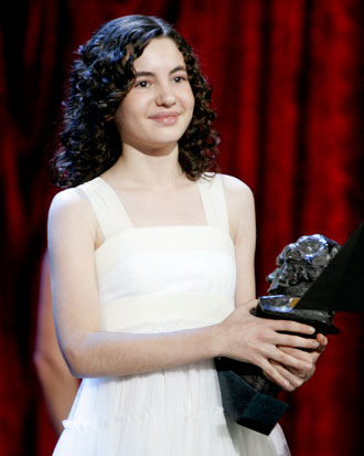 Actress Ivana Baquero holds her