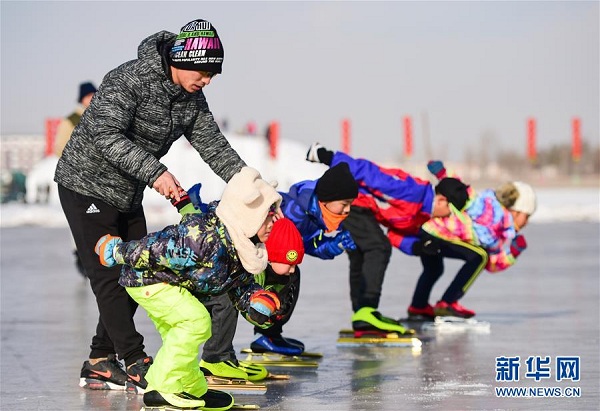 Ice skating on frozen Xilin Lake